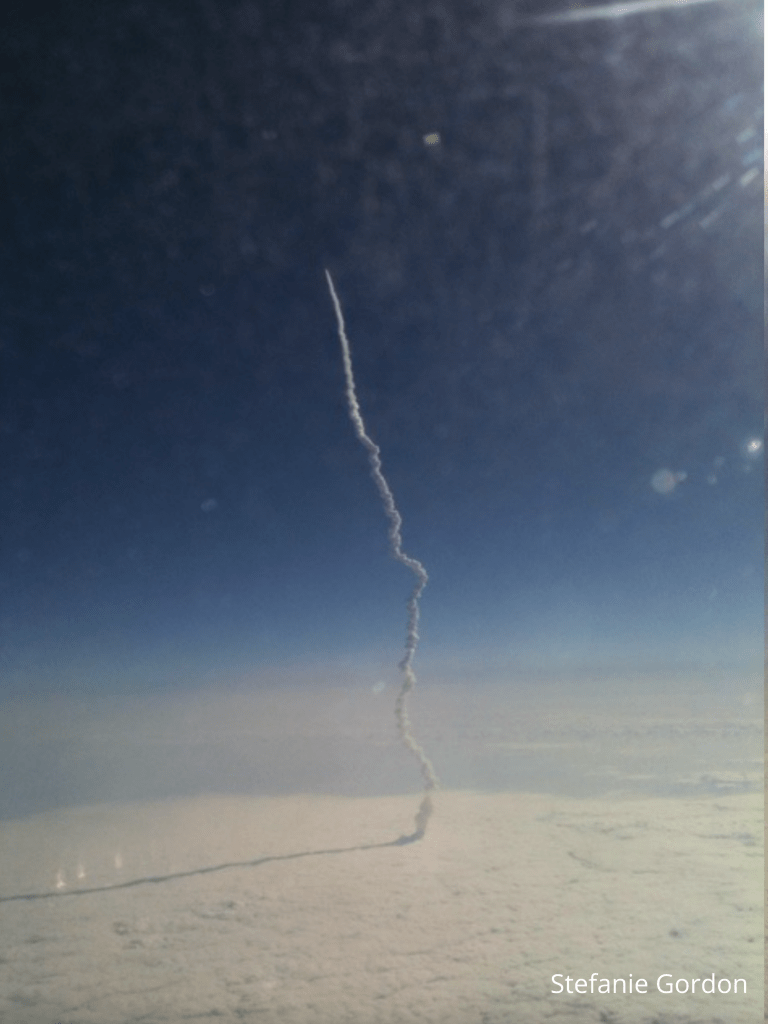 Photo of the launch of the Space Shuttle Endeavor from passing Delta flight 2285 on May 16, 2011